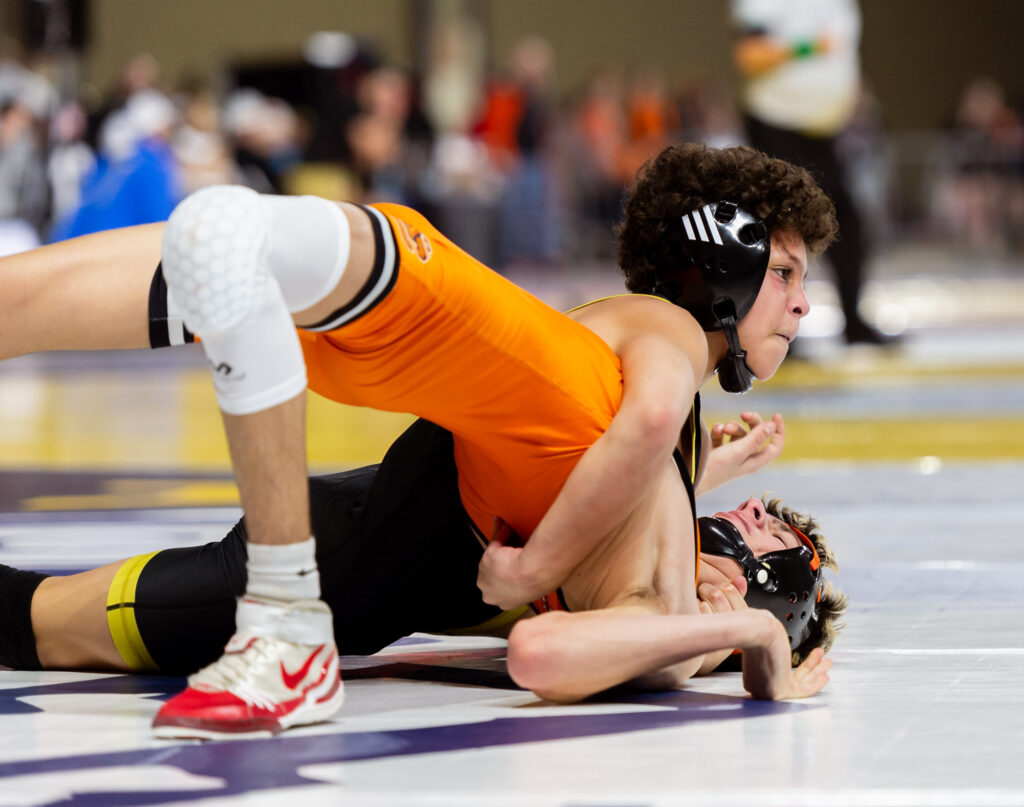 Meridian’s Treyson Lewis-Kelley tries to pin Kalama’s Lukas Tracy Feb. 21 in a 1A boys 106-pound match at Mat Classic XXXVI in the Tacoma Dome.