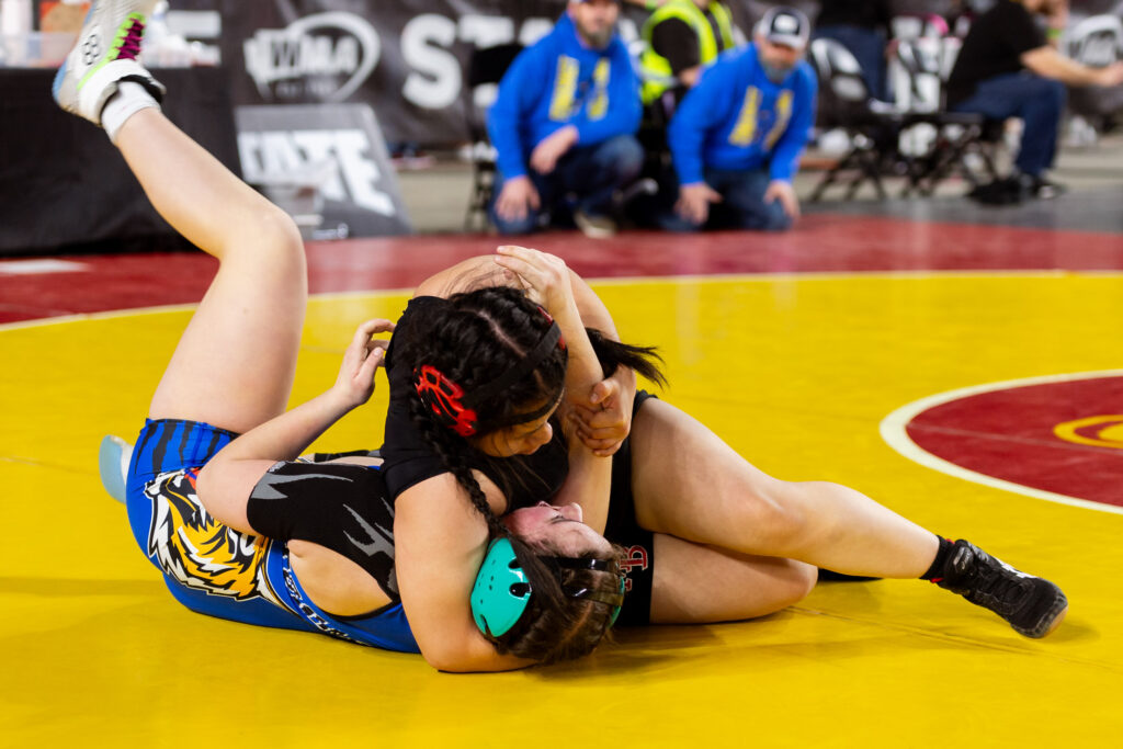 Mount Baker’s Stefany Camacho pins Tonasket’s Milan Pilkinton in a 1A girls 155-pound match.