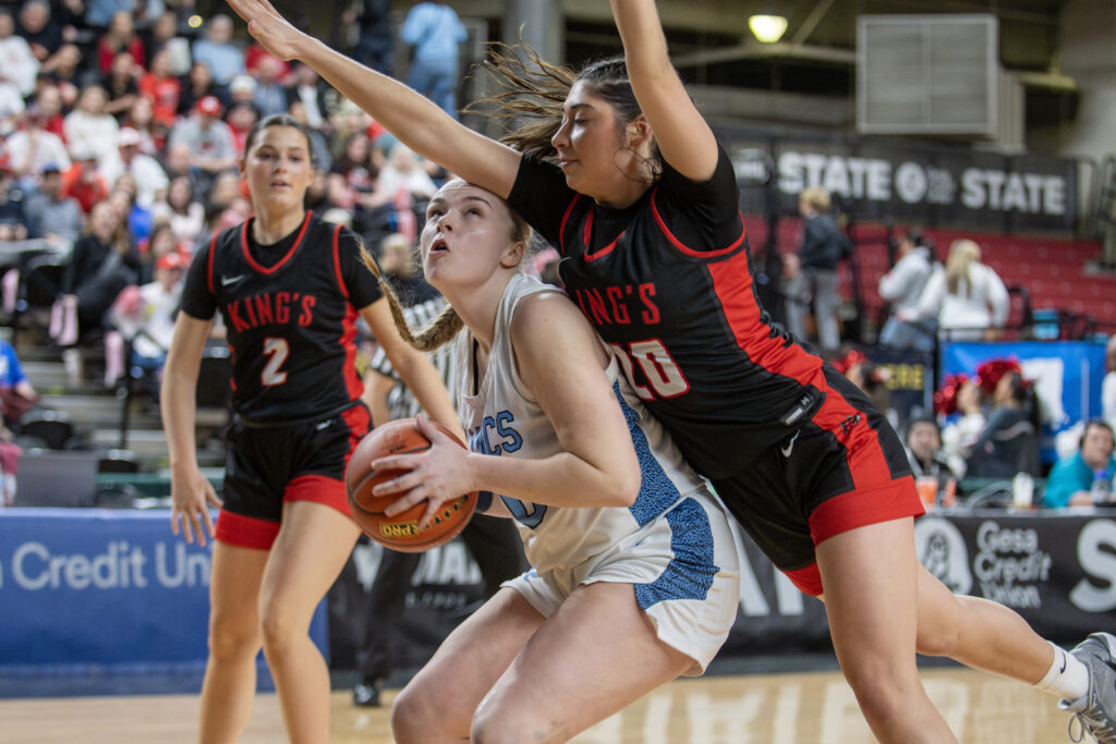 Lynden Christian post Allison Shumate looks for an opening in the paint against King's.