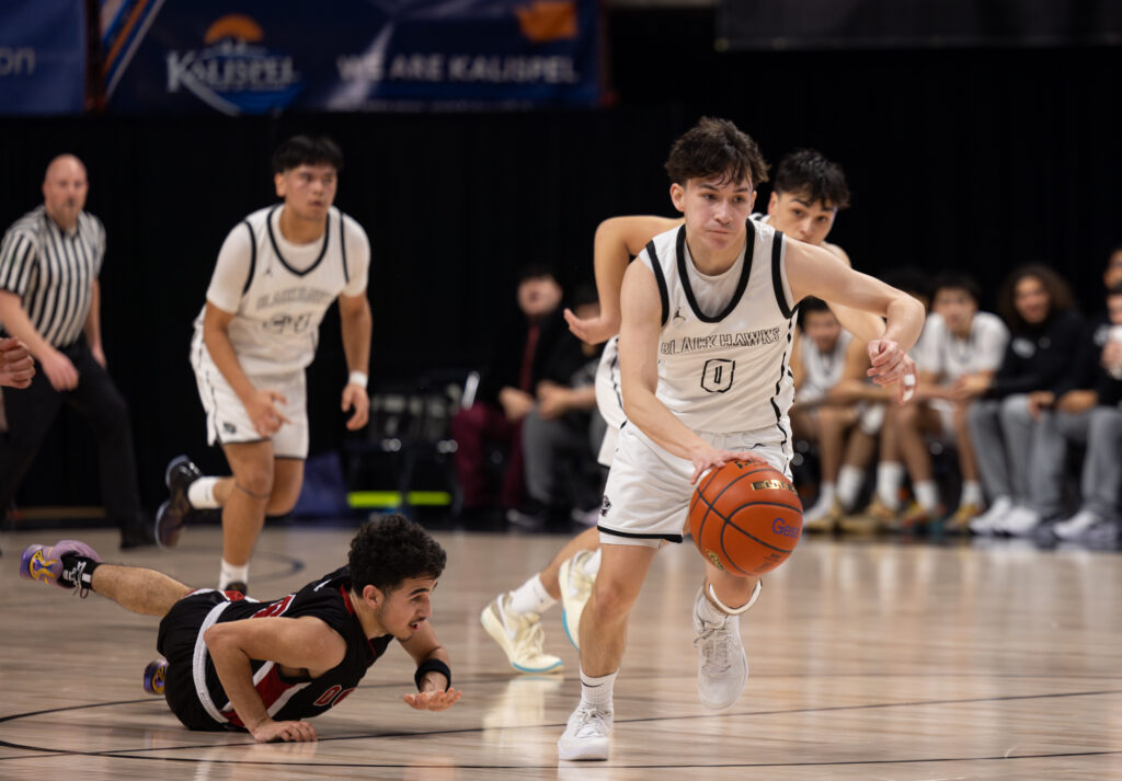 Lummi Nation junior guard Jerome Toby leads a fast break after forcing a turnover March 7 on the way to a 67-27 win over Ocosta in the 1B state quarterfinals at the Spokane Arena. Toby led the Blackhawks with 25 points.