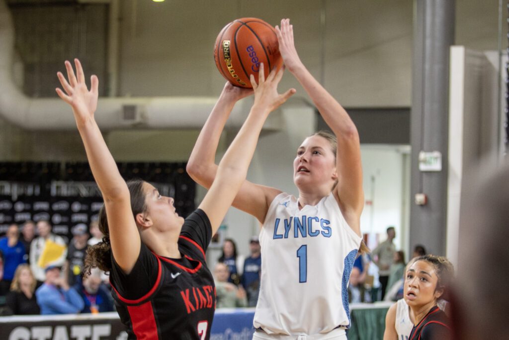 Lynden Christian's Danya Dykstra takes a jump shot at the top of the key.