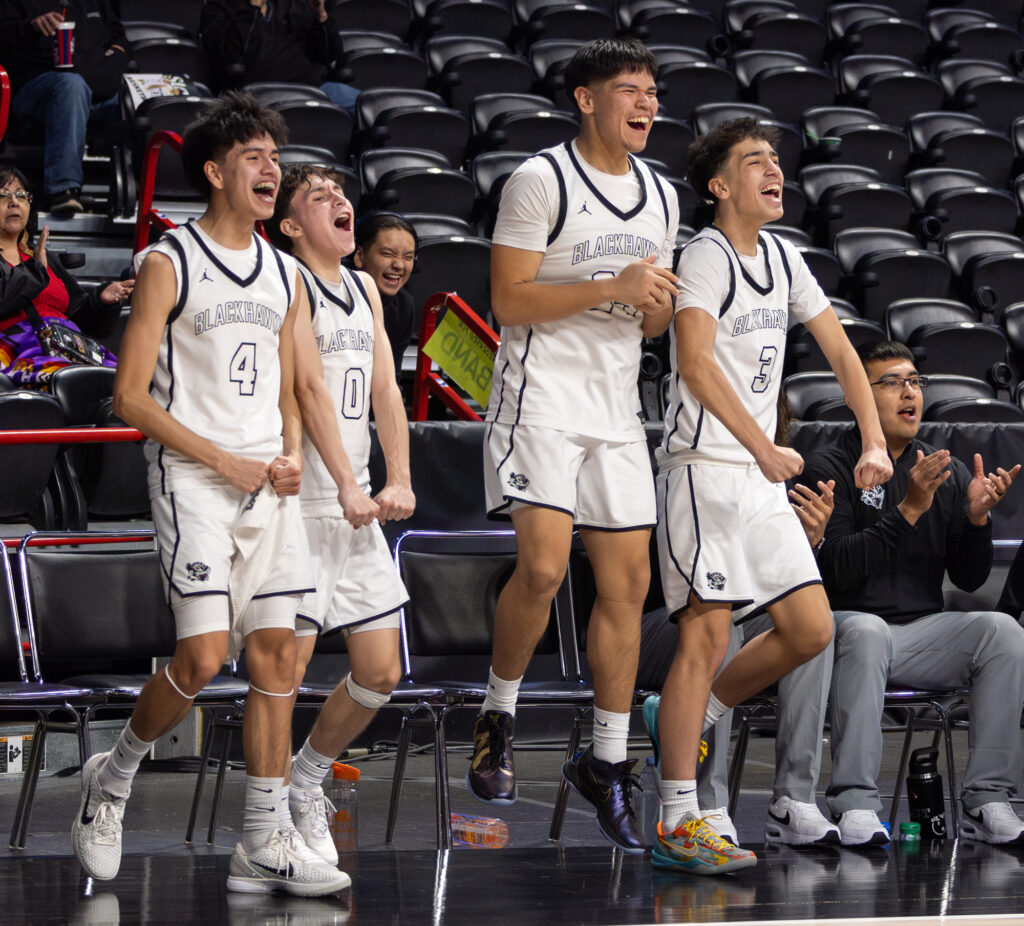 Lummi Nation starters react late in the fourth quarter as senior forward Andrew Tangeant earns a trip to the free-throw line.