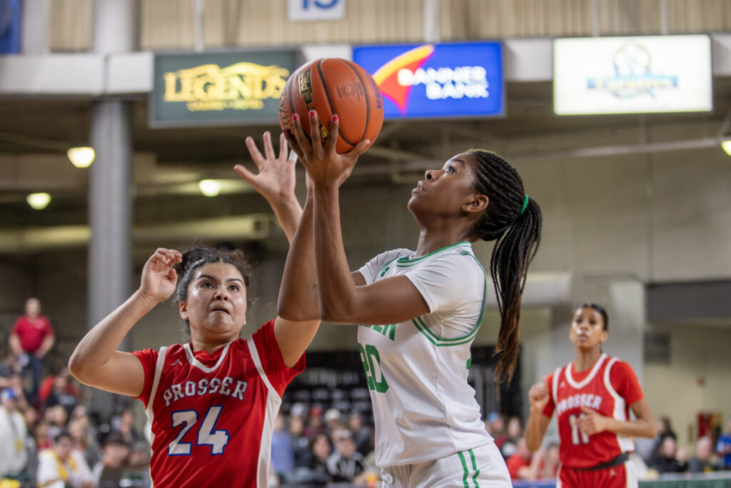 Lynden's Kiki York put up an inside shot with Prosser's Naomi Chavez defending.