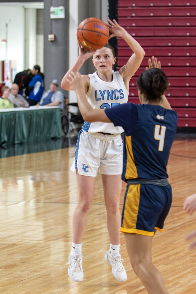 Lynden Christian sophomore Ellie Pierce shoots a 3-pointer.