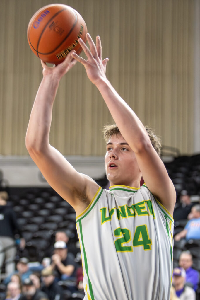 Lynden junior Spencer Adams lines up a wide-open corner 3-pointer.