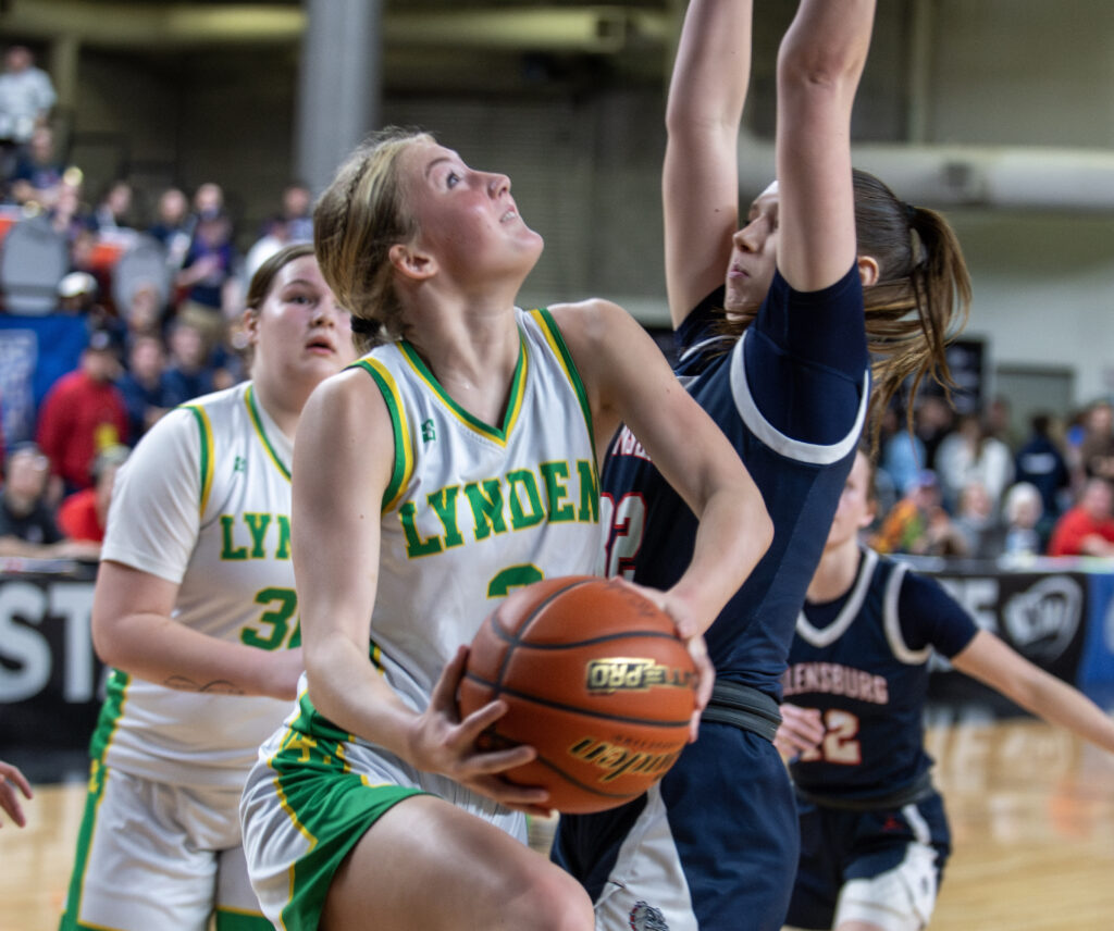 Lynden's Lexi Hermanutz drives under the hoop for a reverse layup.