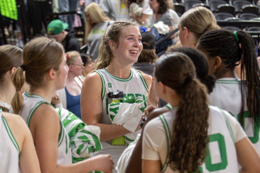 Lynden sophomore Finley Parcher is all smiles March 7 after the Lions' 62-44 win over Prosser in a 2A state semifinal match at the Yakima Valley SunDome.