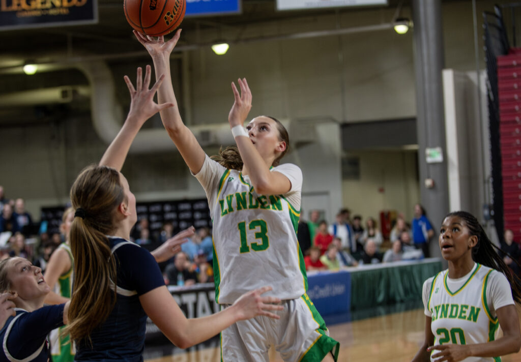 Lynden freshman Izzie Stephan gets a shot off close to the bucket in the first half.