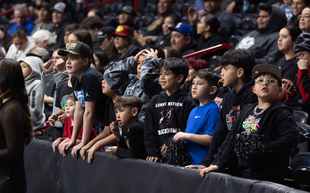 Young Lummi Nation fans react after a missed buzzer-beater.