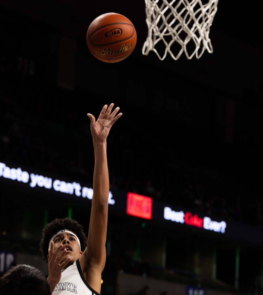 Senior forward Trevon Lee puts up a floater near the hoop.