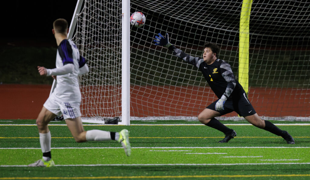 Anacortes senior Riley Walgamott watches the ball get past Ferndale's Joshua Ruble March 13 as the Seahawks beat the Golden Eagles, 3-0, in both team's season opener at Ferndale High.