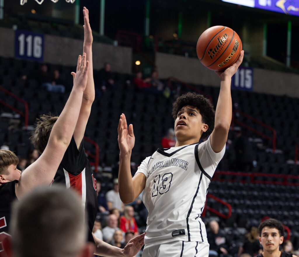 Senior forward Trevon Lee floats up a shot.