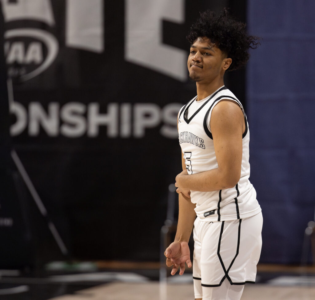 Senior forward Tony Abrams celebrates after hitting a 3-pointer.