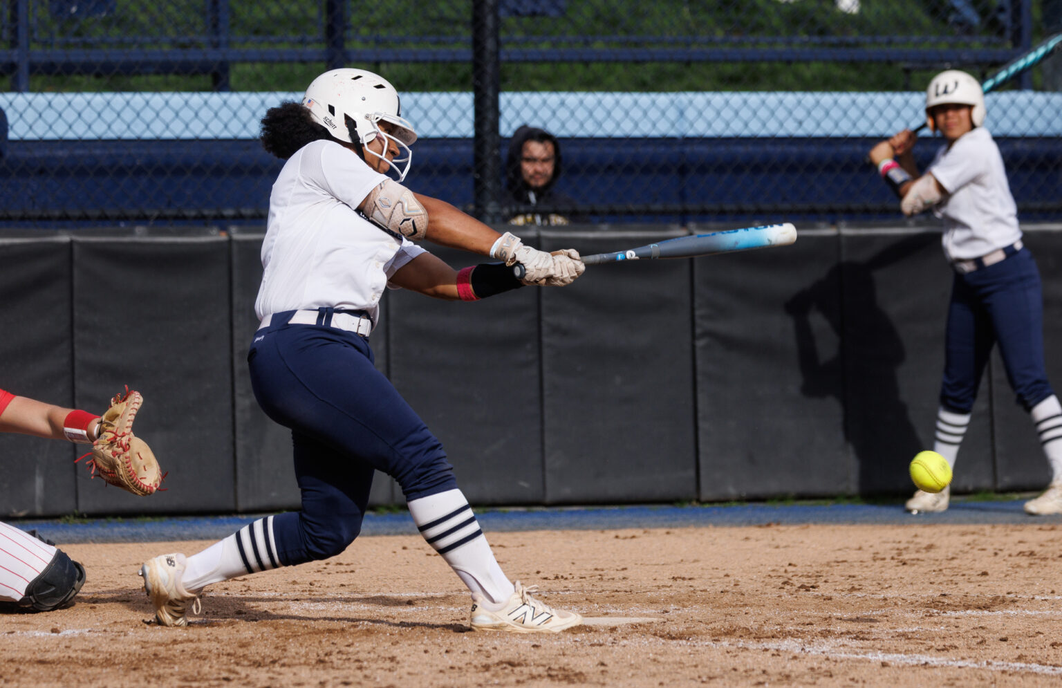 Western's Maleah Andrews connects and drives in three runs.