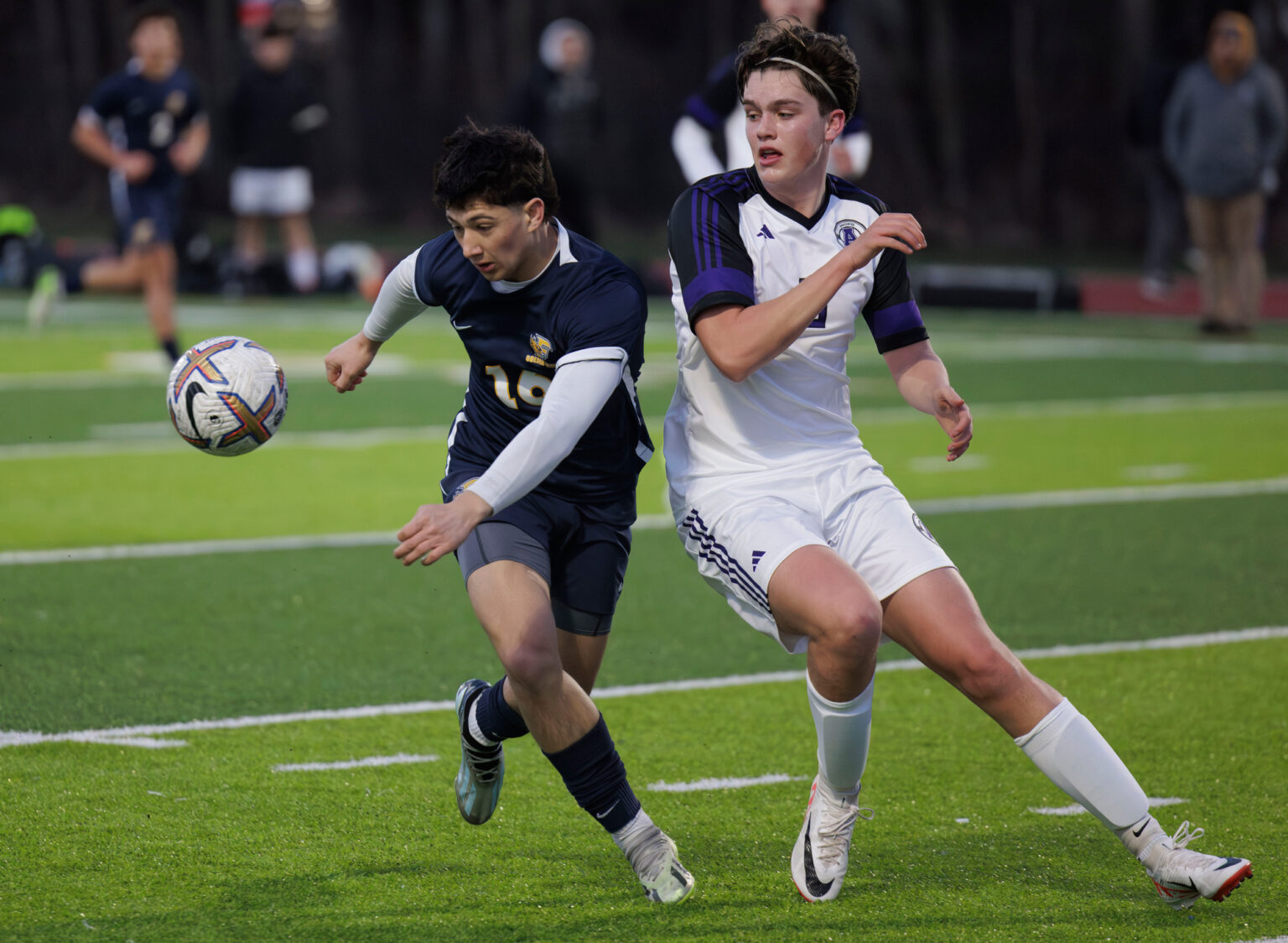 Ferndale's Bryce McManus keeps the ball away from an Anacortes player.