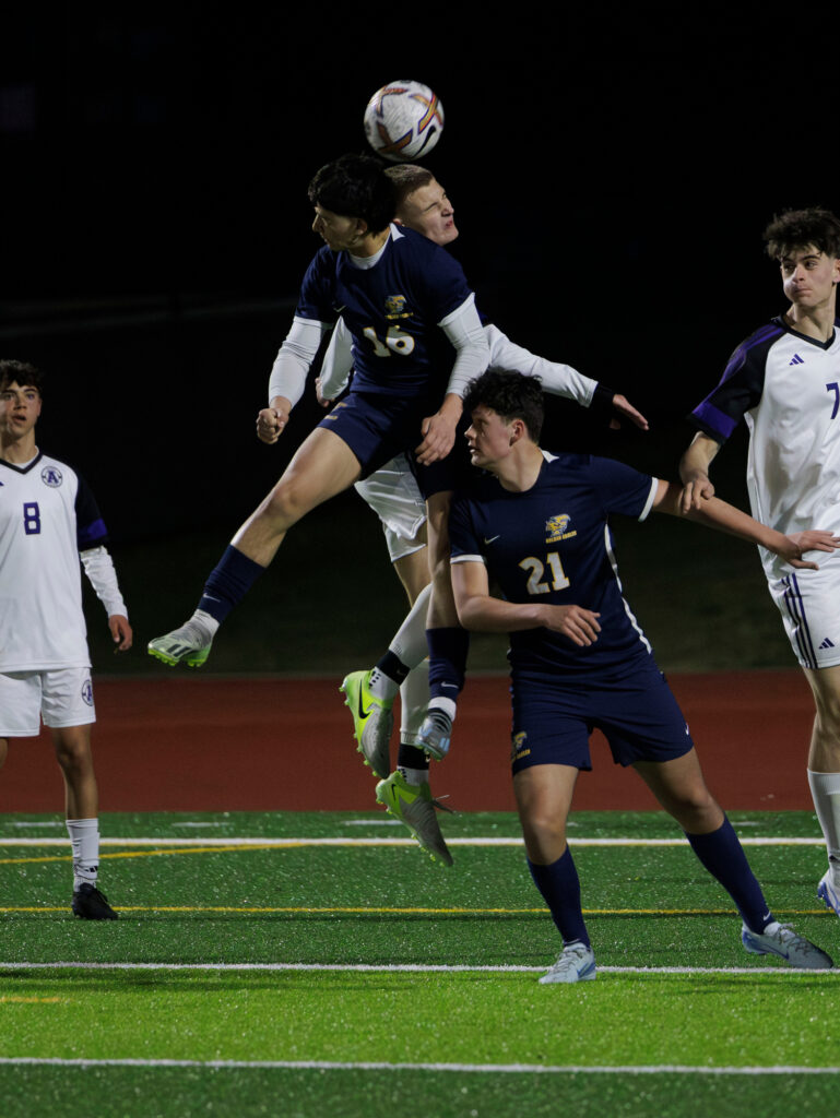 Ferndale's Bryce McManus heads the ball on a corner kick against Anacortes.