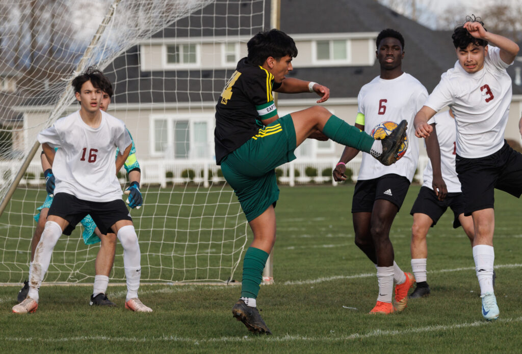 Lynden’s Victor Huaracha takes a shot on goal.